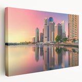 Large art depicting the Brisbane skyline in muted blue tones on stretched canvas, suitable for kitchen wall art.
