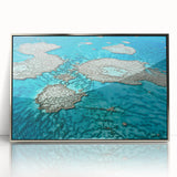 Acrylic print of the Great Barrier Reef in pastel shades, framed in silver, suitable for modern nursery decor.