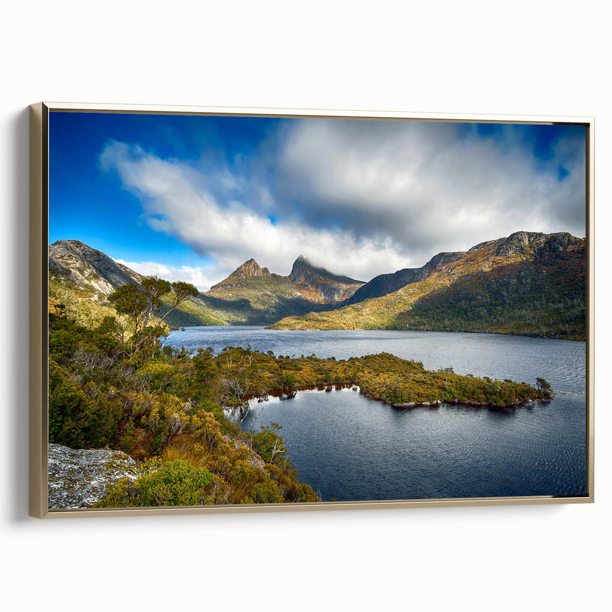 Vintage poster art of Tasmania scenery on framed canvas, featuring gold and black color palette, ideal for living room decor.