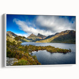 Framed canvas of a Tasmanian landscape with vibrant greenery and blue skies, ideal for living room decor.