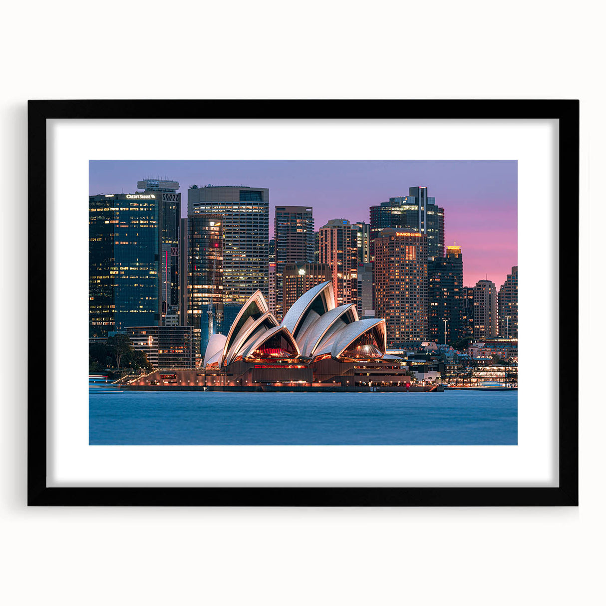 Abstract art print of vibrant, colorful Australian scenery on a large textured canvas, framed in black.