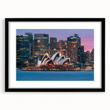 Abstract art print of vibrant, colorful Australian scenery on a large textured canvas, framed in black.