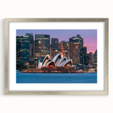 Extra large abstract art print depicting textured scenery of Australia in muted earth tones, framed in silver.