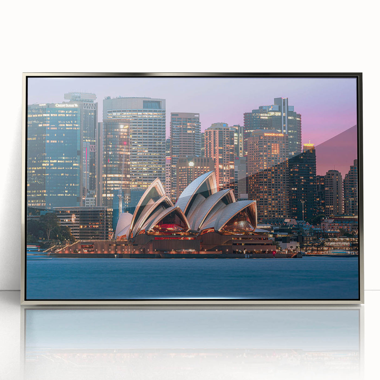 Large art print of an Australian landscape in muted earth tones on a silver-framed acrylic.