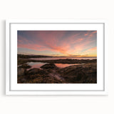 Abstract art print of New Brunswick scenery in muted earth tones on a framed white mat, ideal for dining room decor.
