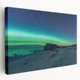 Side view of a stretched canvas depicting a serene Newfoundland landscape in muted green and blue tones.