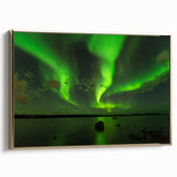 Framed canvas featuring a landscape painting of the Northwest Territories with a vintage poster style and black and gold…