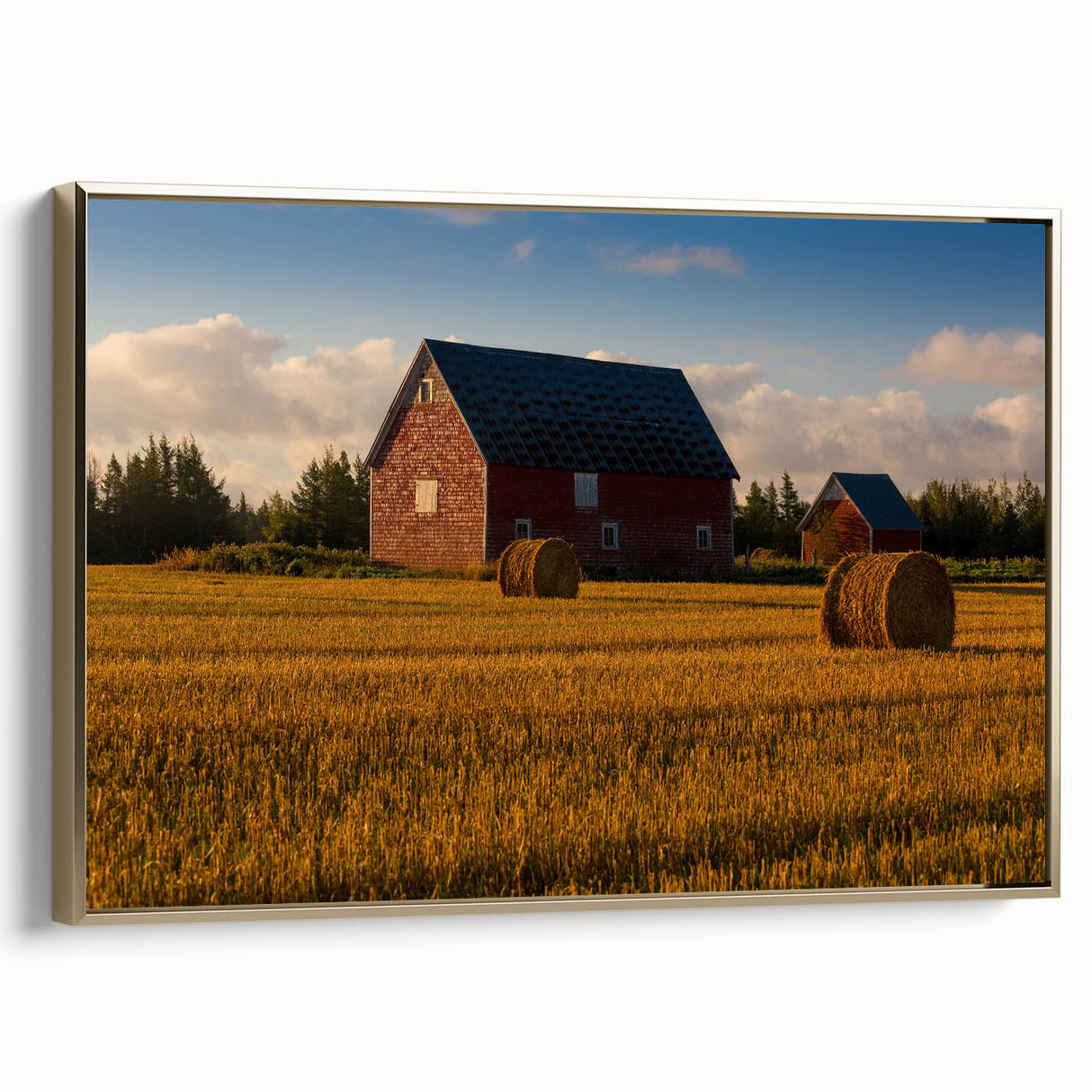 Framed canvas of a vintage-style landscape painting depicting Prince Edward Island, with muted earth tones.