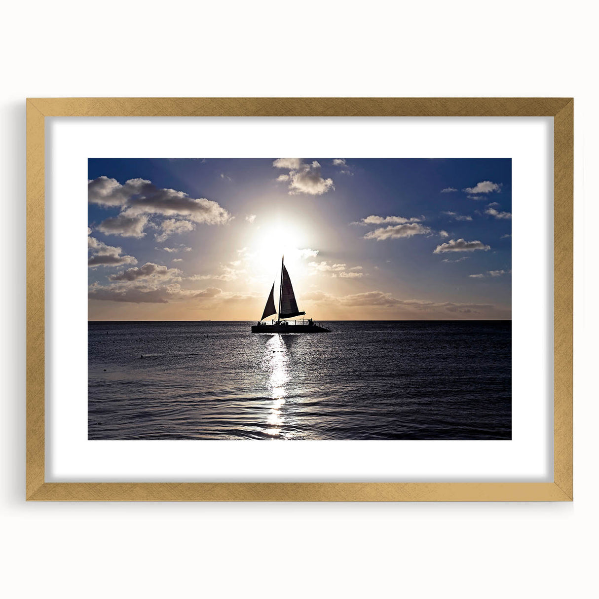 Abstract art print of a Caribbean seascape in blue and green tones, framed in gold, suitable for dining room decor.