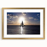 Abstract art print of a Caribbean seascape in blue and green tones, framed in gold, suitable for dining room decor.