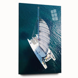 Large abstract wall art of a Caribbean seascape in blue and turquoise tones on acrylic glass.