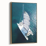 Vintage poster art of a Caribbean scene on a framed canvas, featuring vibrant colors and a gold frame.