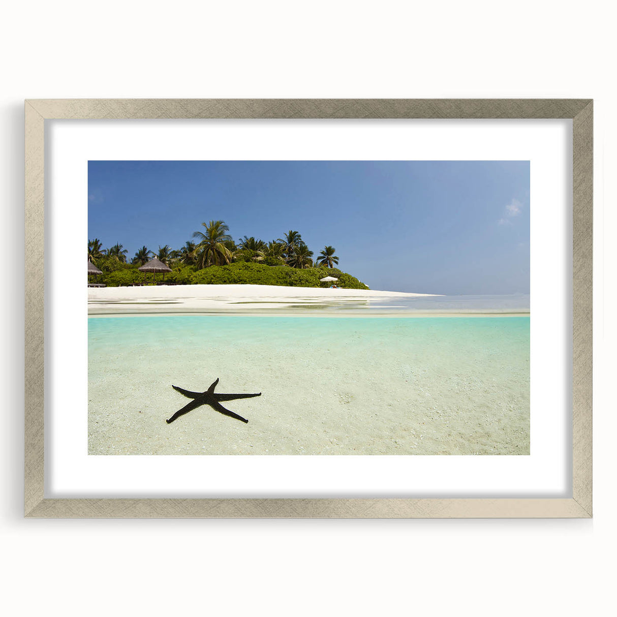 Extra large wall art featuring an abstract Caribbean scenery in textured greens and blues on a framed silver mat.
