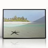 Large abstract wall art of a Caribbean seascape in muted blue and green tones on a framed acrylic.