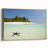 Framed canvas wall art depicting a vintage-style landscape of Martinique with lush greenery and gold frame.