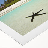 Art deco poster of a Caribbean scenery in muted blue and green tones on rolled canvas, ideal for dining room wall art.