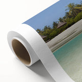 Art Deco style poster of a Caribbean scenery on rolled canvas, featuring vibrant blue and green tones.