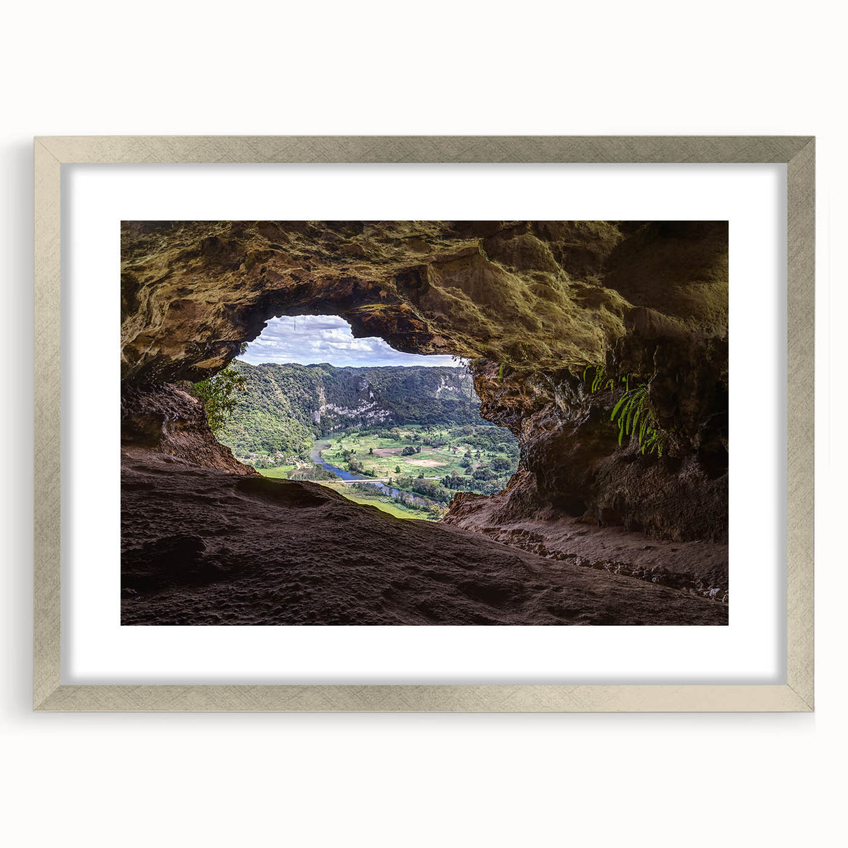 Extra large abstract art print featuring textured Caribbean scenery in muted blue and green tones, framed in silver.