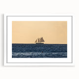 Textured art depicting an abstract Caribbean landscape in blue and green tones on a framed white mat.