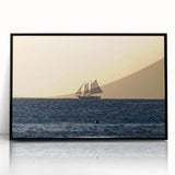 Large abstract wall art featuring a Caribbean scenery in muted blues and greens, acrylic print in a black frame.