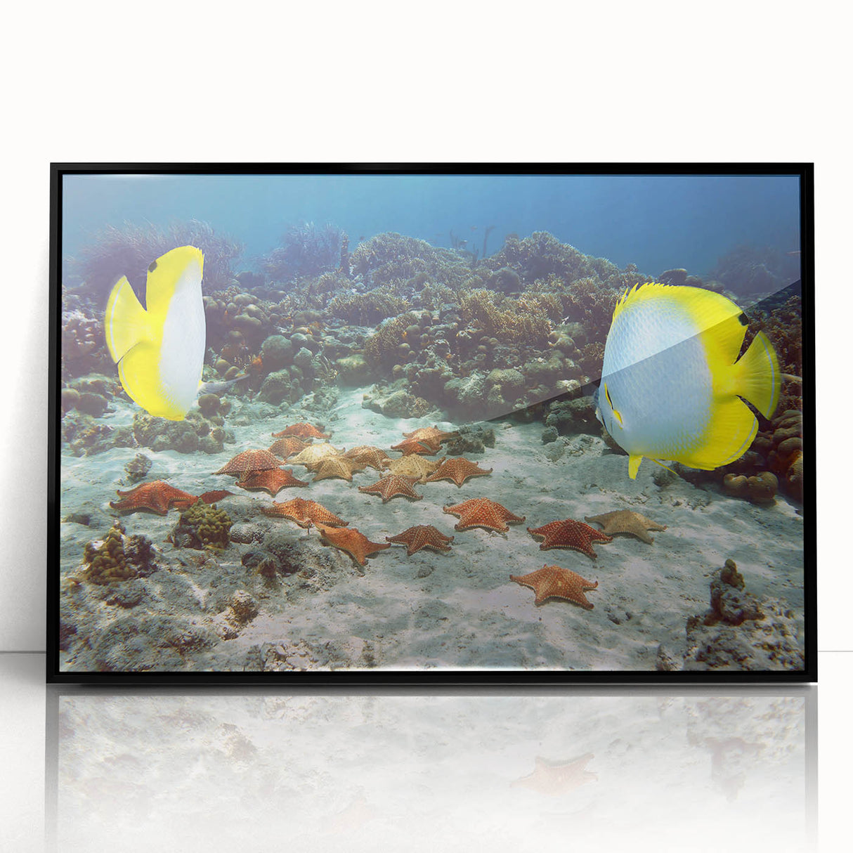 Large abstract wall art depicting a Caribbean scenery in vibrant blue and green hues on a framed acrylic.