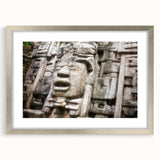 Textured abstract art print depicting a serene Belize landscape in soft blue and green tones, framed in silver.