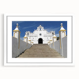 Abstract art print of a Central American landscape in muted earth tones on a white framed canvas.