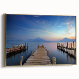 Framed canvas featuring a vintage-style landscape painting of a Guatemalan scenery in black and gold tones.