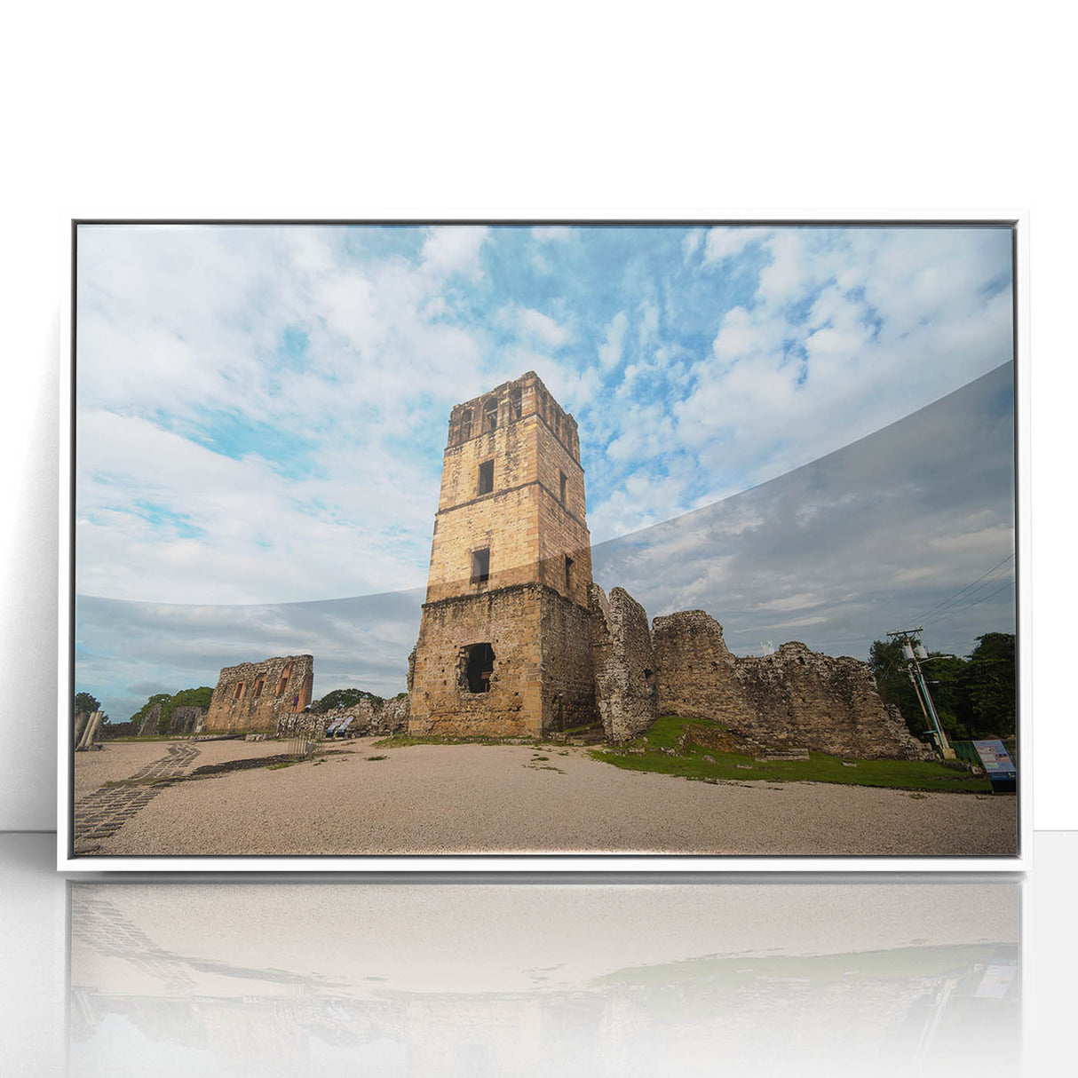 Art deco poster of Panama scenery in muted green and blue tones, acrylic print framed in white.