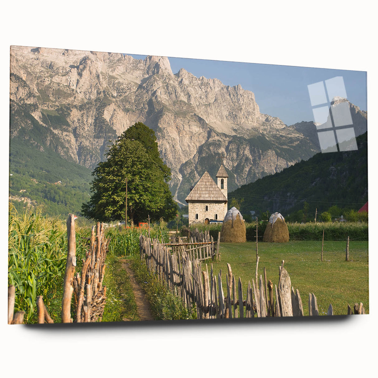 Large abstract depiction of an Albanian landscape in muted earth tones on acrylic glass.
