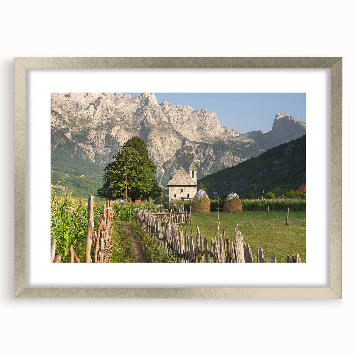 Extra large abstract art print featuring textured scenery of Albania, in silver frame, ideal for living room decor.
