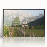 Large art print of an Albanian landscape in mid-century modernist style, featuring muted earth tones on a framed acrylic.