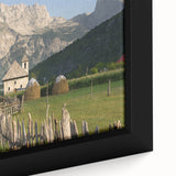 Close-up of a framed canvas depicting a colorful, textured European scenery, ideal for extra large living room wall art.