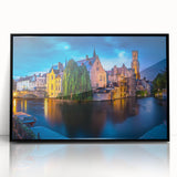 Large abstract wall art depicting a European cityscape in muted gray and blue tones, framed in black acrylic.