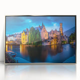 Large art print of a European Belgium scenery in muted green and blue tones on a framed acrylic.