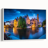 Framed canvas of a vintage European landscape painting, featuring vibrant colors on a black background.