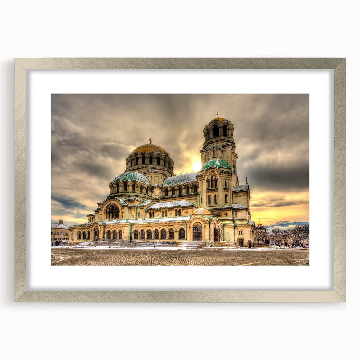 Abstract art print depicting a textured European scenery in muted earth tones on a framed silver mat.