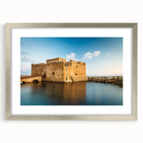 Extra large abstract art print of a textured European scenery in muted earth tones, framed in silver.