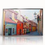 Mid-century modernist art of Prague skyline in muted earth tones on a silver-framed acrylic.