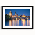 Extra large wall art featuring an abstract art print of a colorful European landscape, in a black frame with mat.