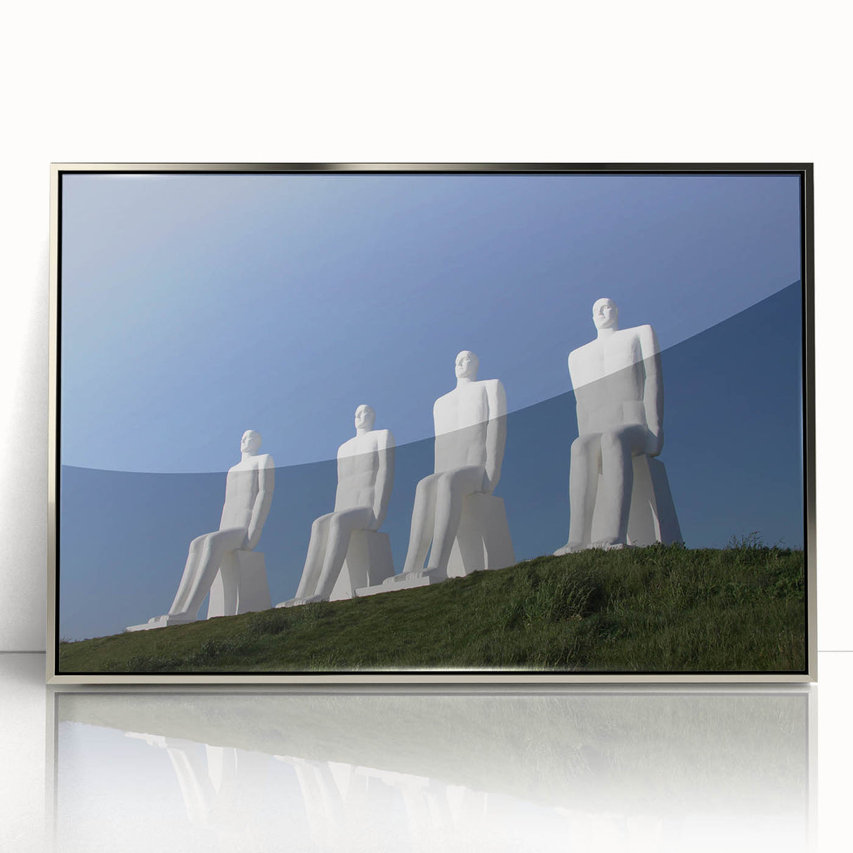 Mid-century modernist art depicting a serene European landscape in muted green and blue tones, silver-framed acrylic print.