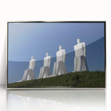 Mid-century modernist art depicting a serene European landscape in muted green and blue tones, silver-framed acrylic print.