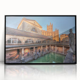 Large abstract wall art depicting a European scenery in muted tones, framed in black acrylic.