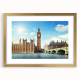 Abstract art print of Big Ben in pastel shades on a gold-framed canvas, suitable for dining room decor.