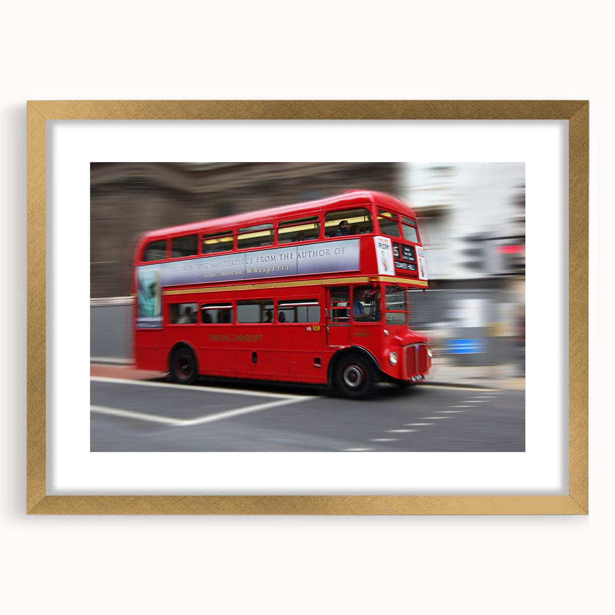 Abstract art print of London skyline in muted blue and gold tones on a framed canvas, ideal for dining room decor.