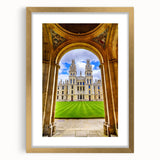 Abstract art print of Oxford scenery in muted earth tones, framed in gold, ideal for dining room decor.