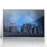 Mid-century modernist depiction of Stonehenge in muted earth tones on a white acrylic framed print.