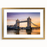 Abstract art print of the Thames River in muted blue and gray tones, framed in gold, ideal for dining room decor.