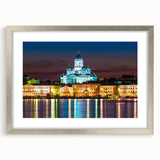 Extra large abstract art print of a textured Finnish landscape in muted blues and grays, framed in silver.