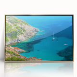 Art deco style poster of a Corsican landscape in muted gold and blue tones, acrylic framed.